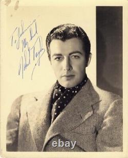 Photographie dédicacée avec inscription signée par Robert Taylor